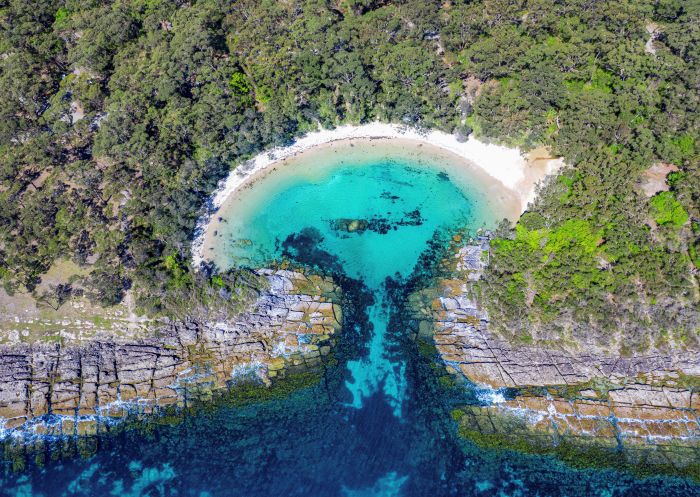 Aerial overlooking Honeymoon Bay - Jervis Bay - South Coast